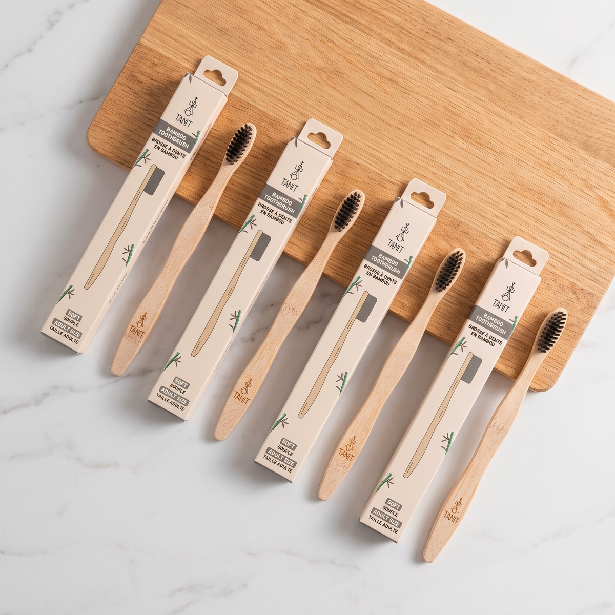 Caisse de 12 brosses à dents adultes souples en bambou charbon